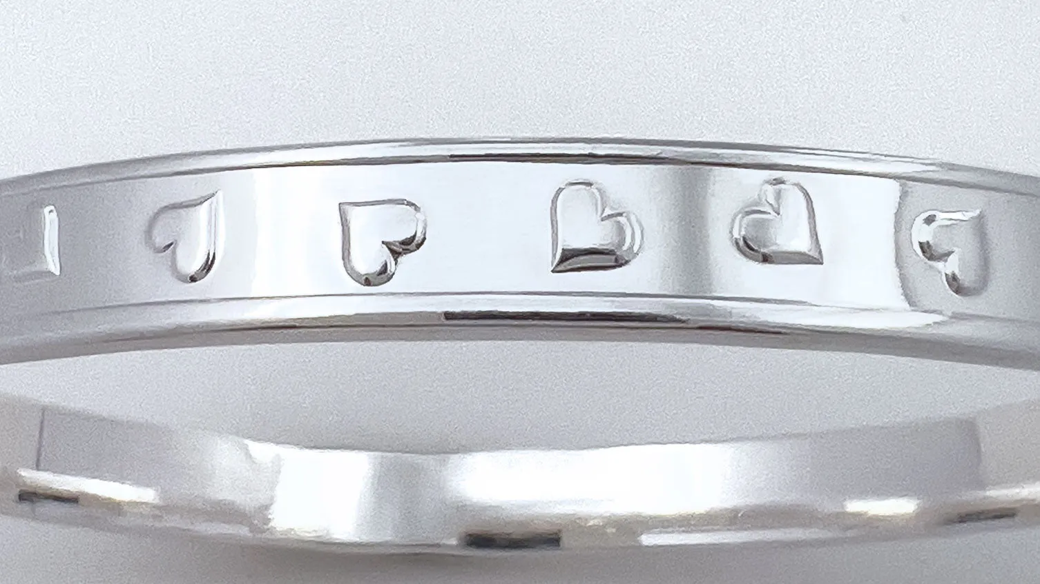 Tumbling Hearts Silver Bangle